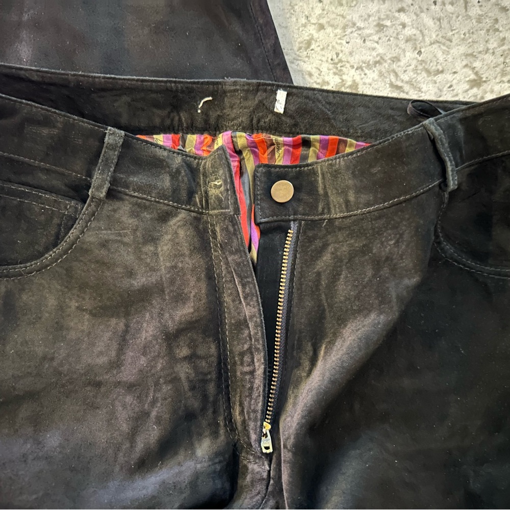 Women’s luxury, leather jeans. Size 8-10. Black. One remaining.